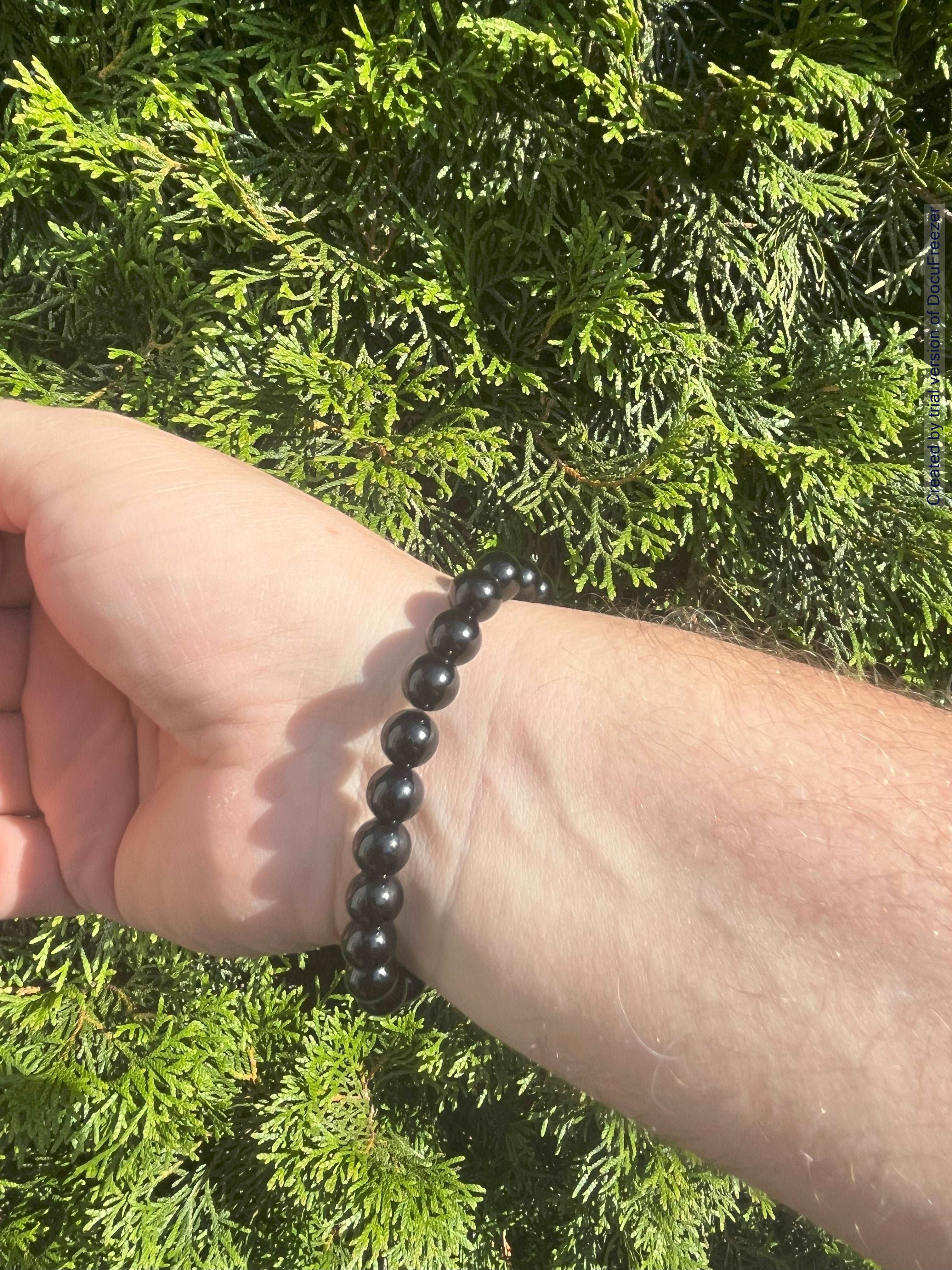 Armband aus Obsidian-Perlen 8 mm mit Charm - verschiedene Varianten - 1 Stück