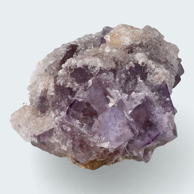 Violetter Fluorit aus Mexiko mit weissem und gelben Quarz Anlagerungen (42g)