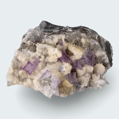 Violetter Fluorit aus Mexiko mit weissem und gelben Quarz Anlagerungen (70g)