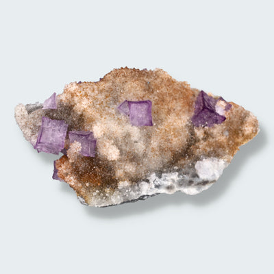 Violetter Fluorit aus Mexiko mit weissen und gelben Quarz Anlagerungen (37g)