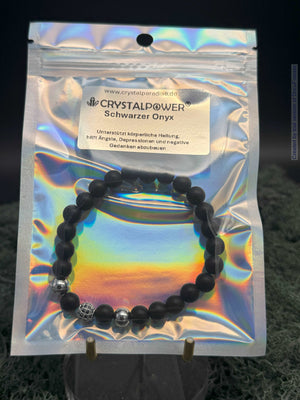 Bracelet en perles d'onyx noir 8 mm avec breloque