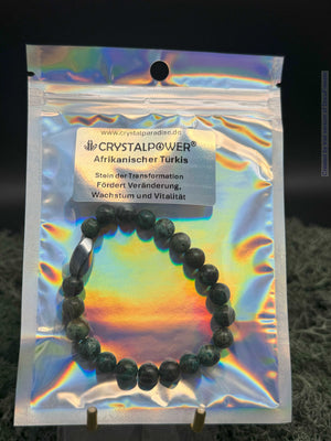 Bracelet en perles de turquoise africaine 8 mm avec breloque