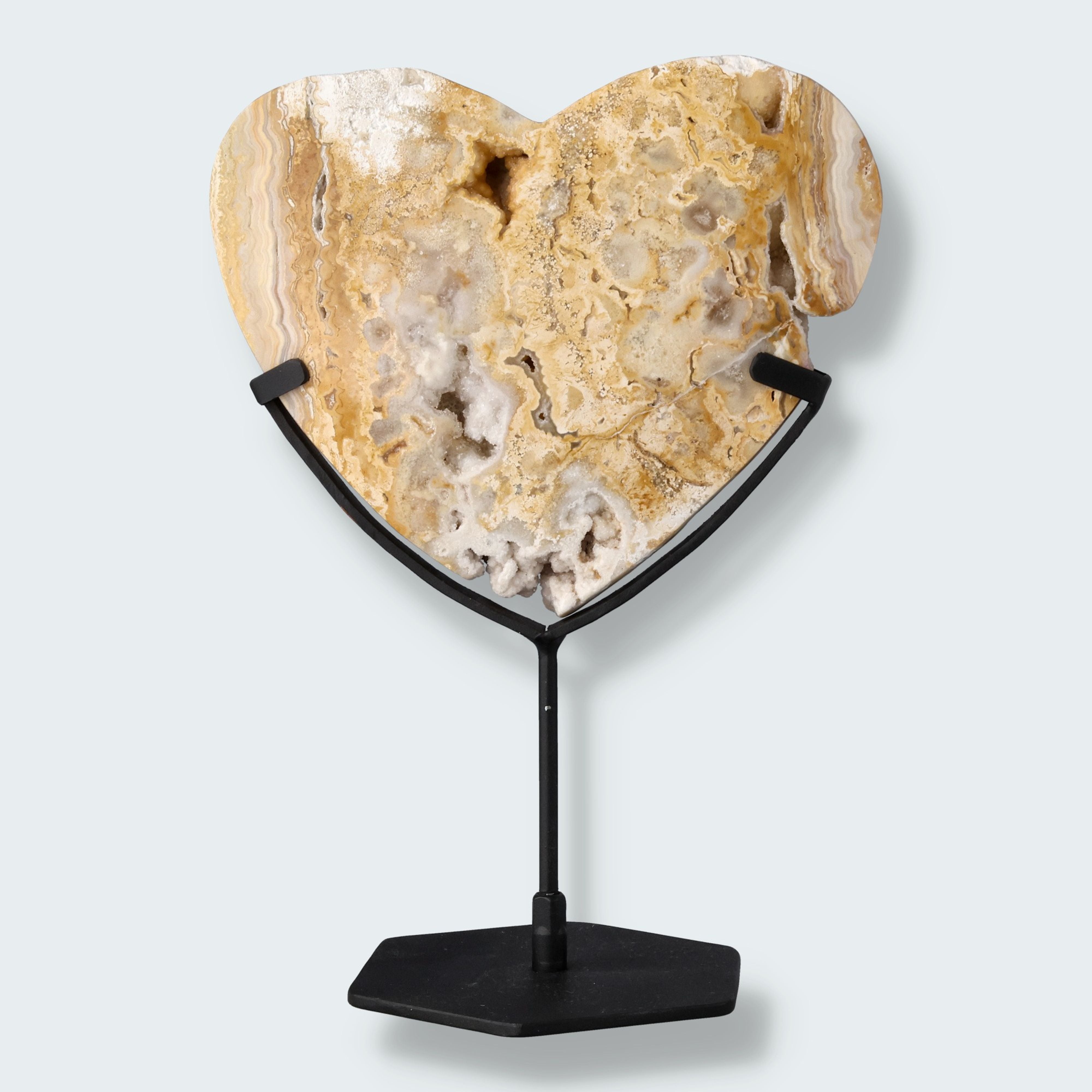 Herz auf schwarzem Standfuss aus poliertem Crazy Laze Achat